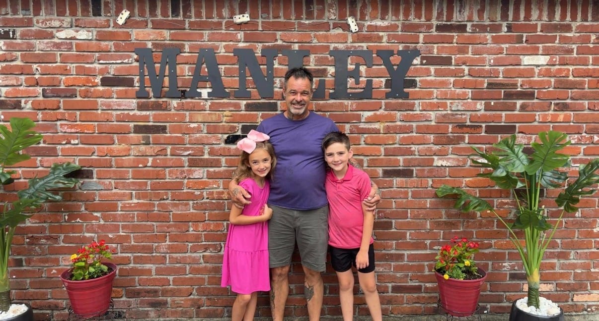 Our master plumber, Kevin, and his two youngest children